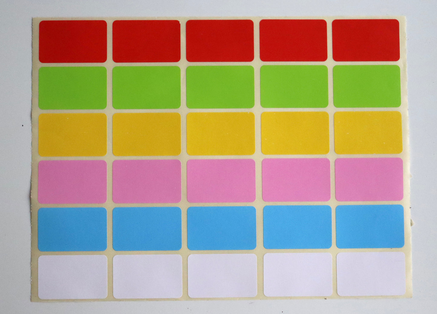 Grid of blank rectangular stickers in red, green, yellow, pink, blue, and white rows.