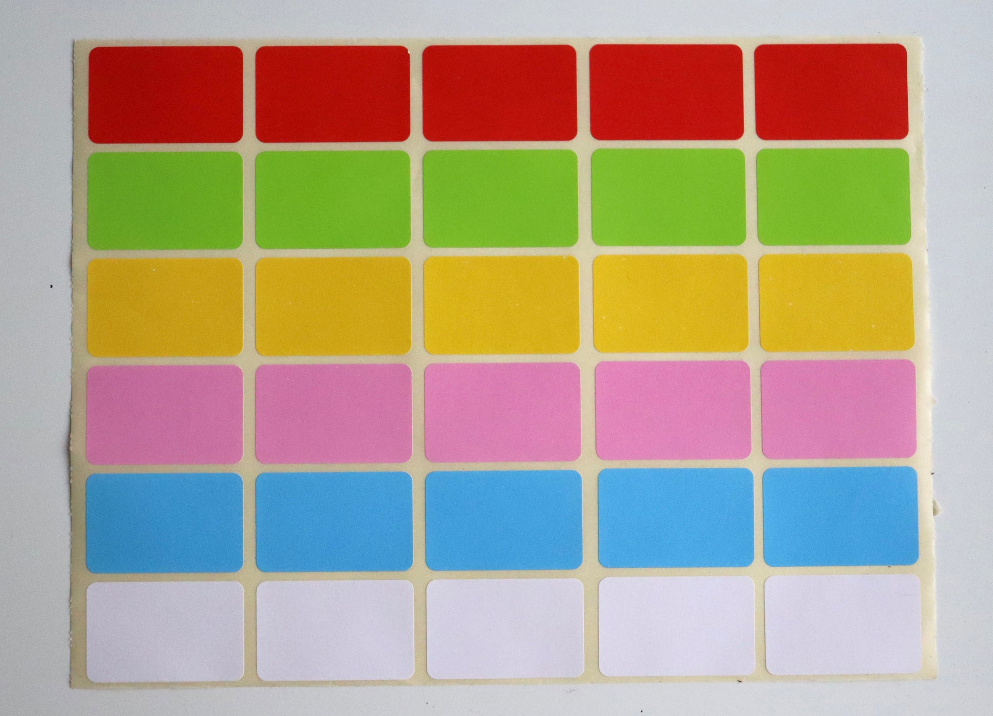 Grid of blank rectangular stickers in red, green, yellow, pink, blue, and white rows.