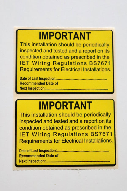 Multiple BS7671 Periodic Test Inspection Labels on a sheet, 76×52mm yellow electrical safety stickers.