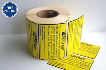 Multiple BS7671 Periodic Test Inspection Labels on a roll, 76×52mm yellow electrical safety stickers.